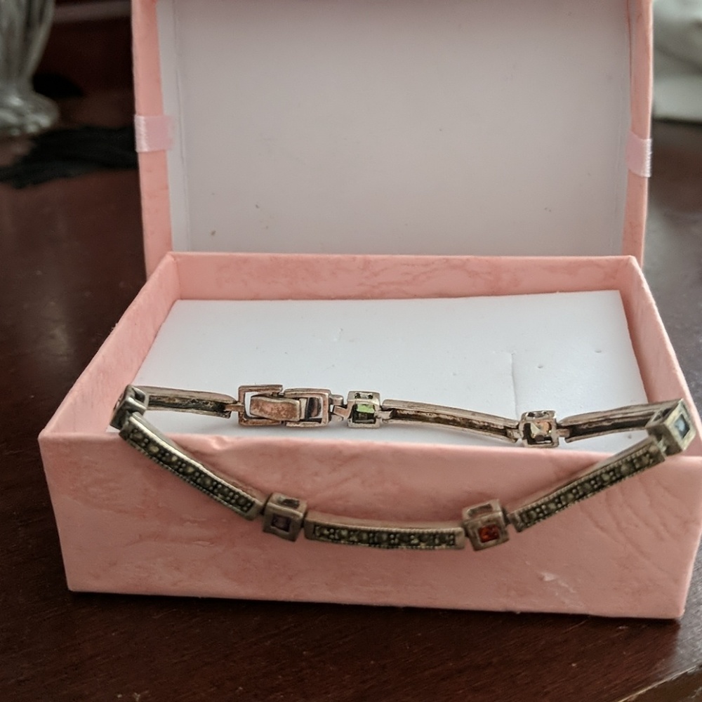 Multicolor stones in silver bracelet